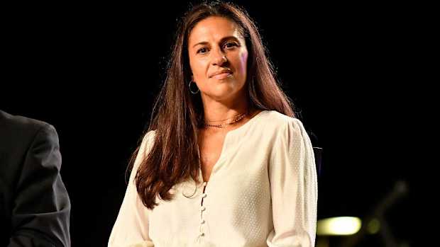Former USWNT midfielder Carli Lloyd looks on during her retirement celebration.